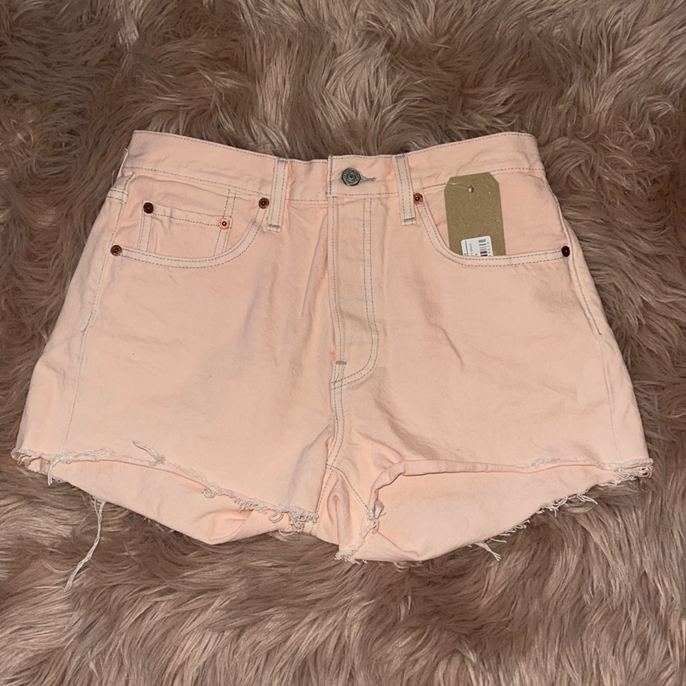 Light baby pink Levi’s shorts